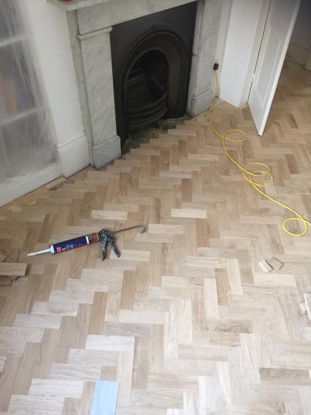 portfolio hardwood flooring harringbone wood install 03