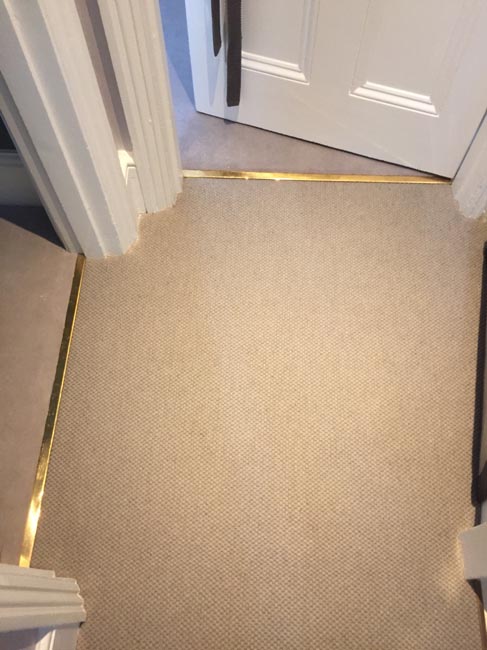 portfolio carpets grey stairs black border golden stairrods 07