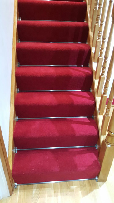 portfolio-carpets-lucious-red-carpet-with-stair-rods-01