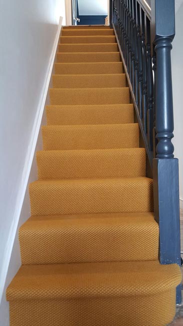 portfolio-carpets-orange-beige-stair-close-covered-fitting-01