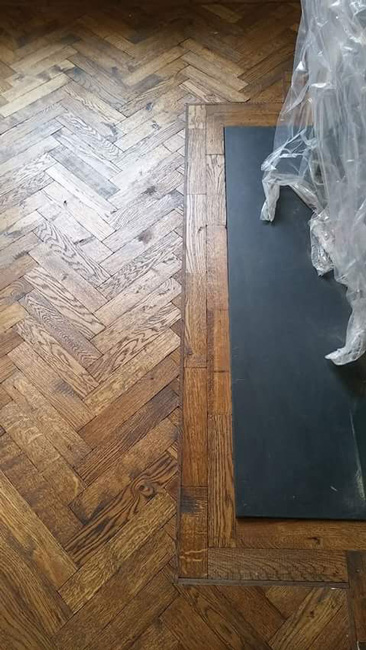 portfolio-hardwood-floors-herringbone-wood-in-bedroom-01