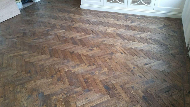 portfolio-hardwood-floors-herringbone-wood-in-bedroom-02