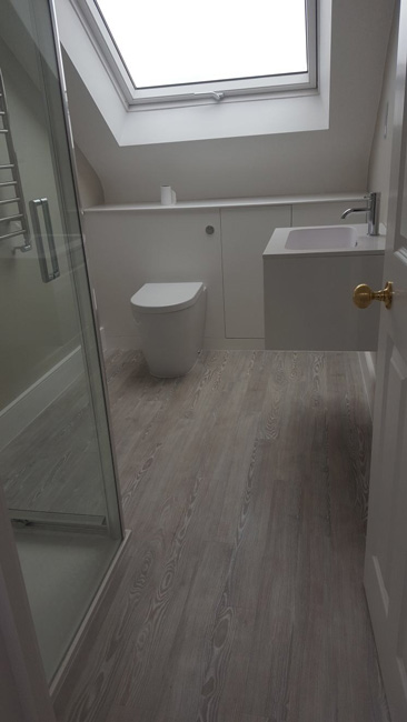 portfolio smooth floors amtico grey wood effect bathroom and bedroom 01