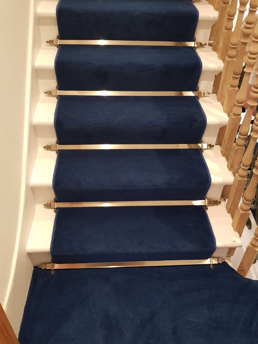 portfolio blue stair carpet as a runner with bronze stair rods 04