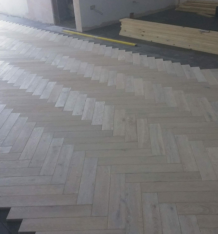 PORTFOLIO - SAADI HOMES WOOD HERRINGBONE INSTALLATION (5)