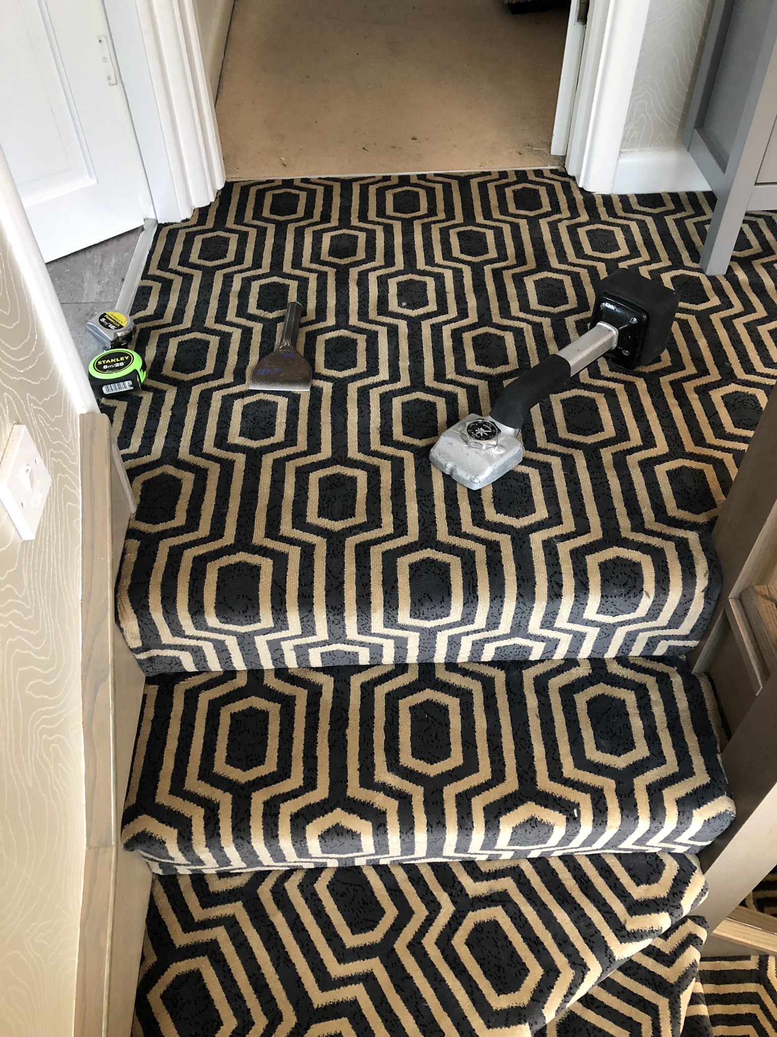 Black Axminster carpet installed in Acton 4