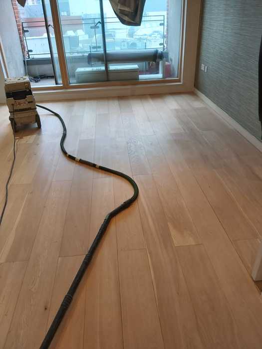 Sand and Seal Selected Areas of Wood Flooring Installed in Barnes 4