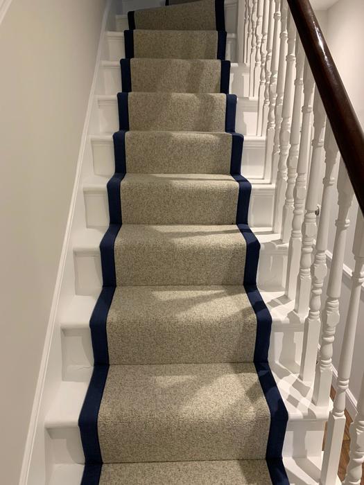 White Carpet with black border on Stairs Installed in Islington 3