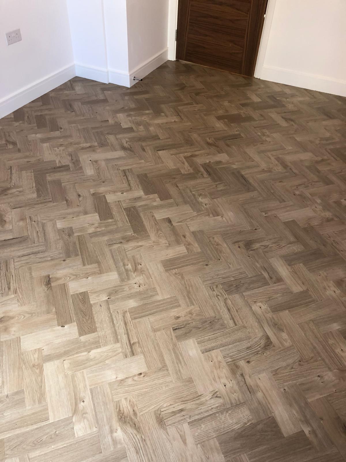 To supply & install Amtico Spacia Sun Bleached Oak luxury vinyl flooring in Kilburn 3