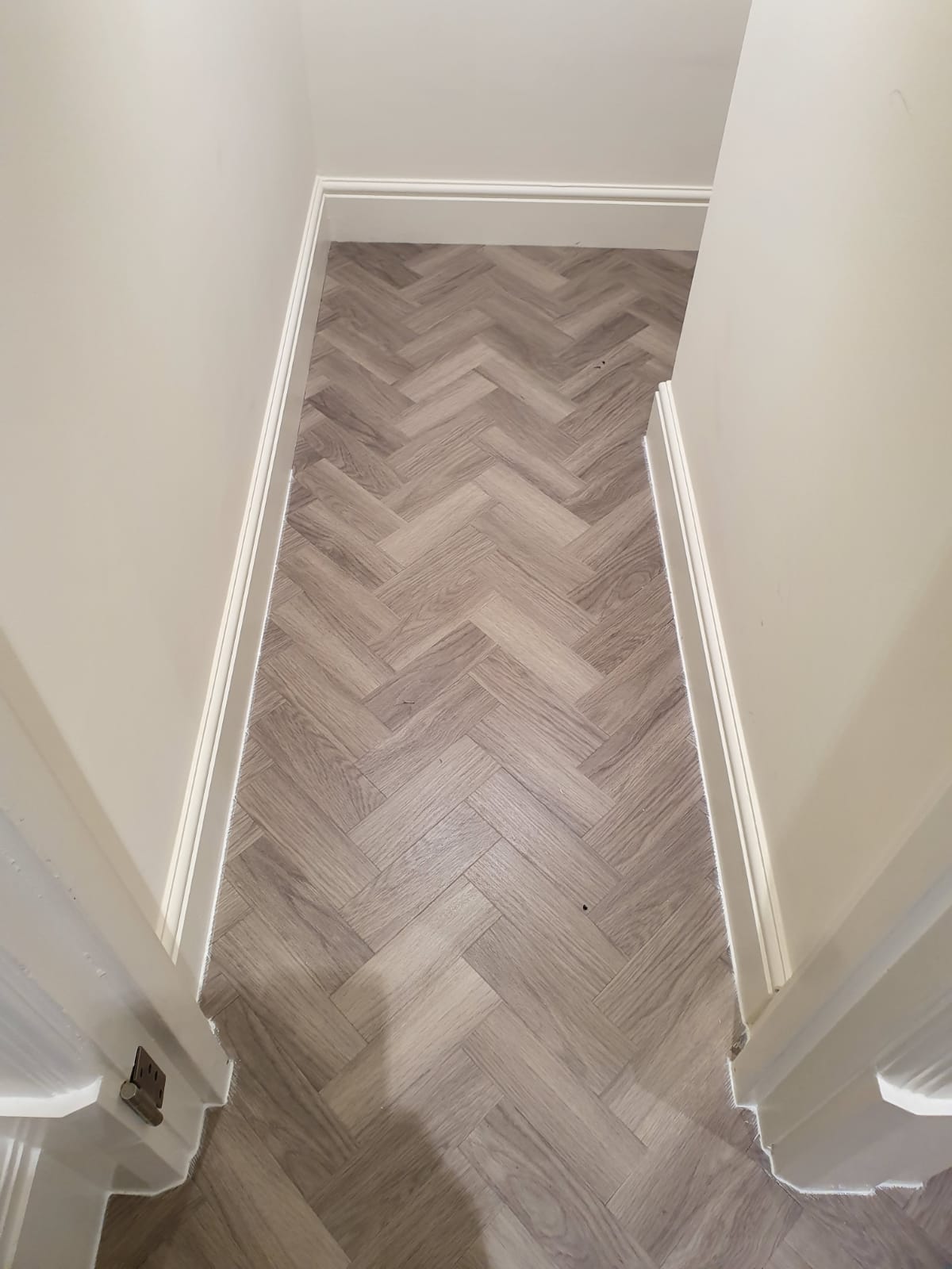 Amtico Spacia Nordic Oak in Herringbone Design to Premises 17