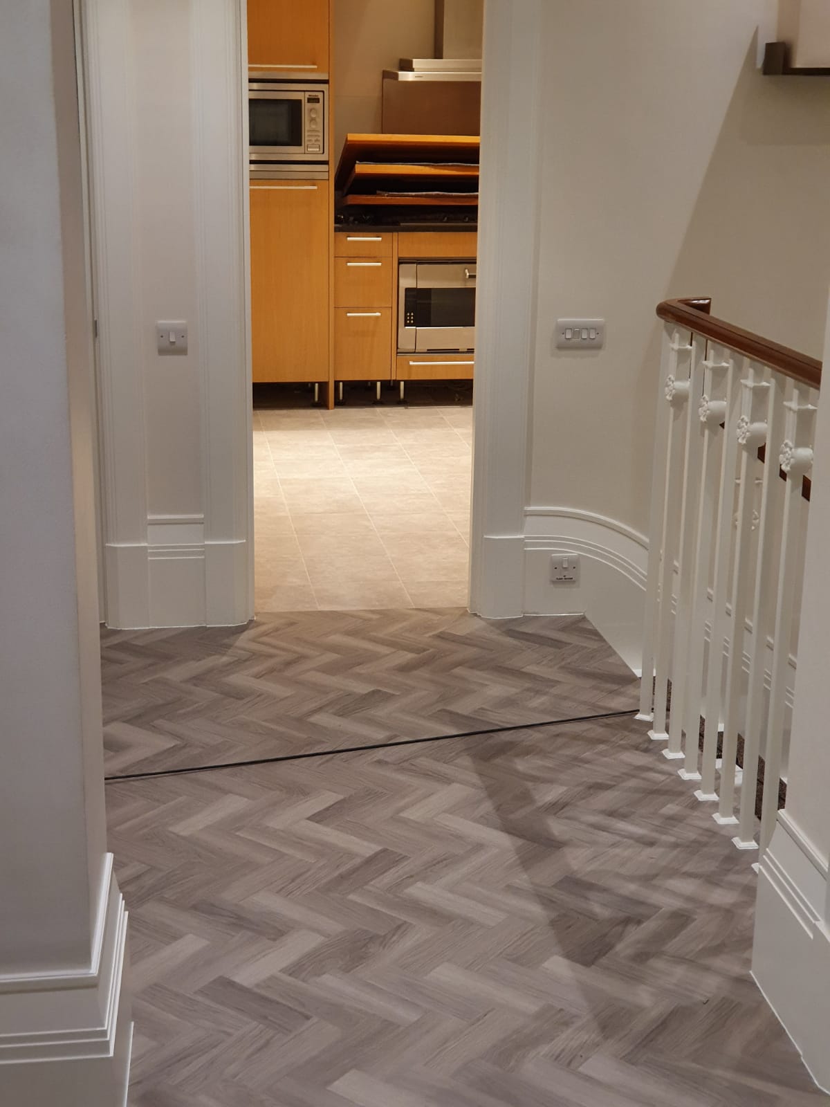 Amtico Spacia Nordic Oak in Herringbone Design to Premises 7