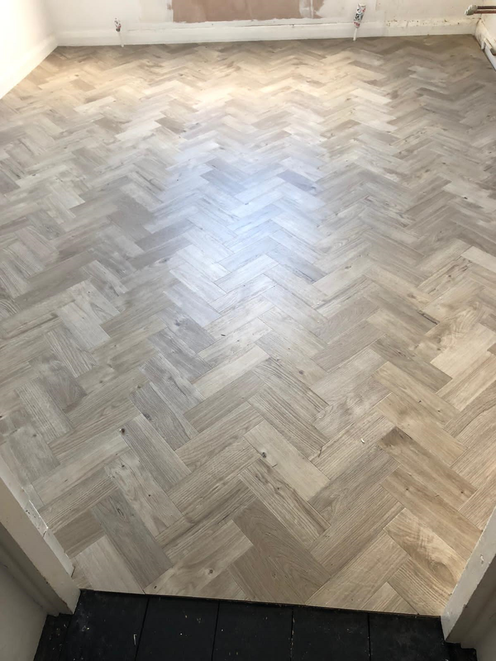Amtico Spacia Sun Bleached Oak in a Parquet Design 1