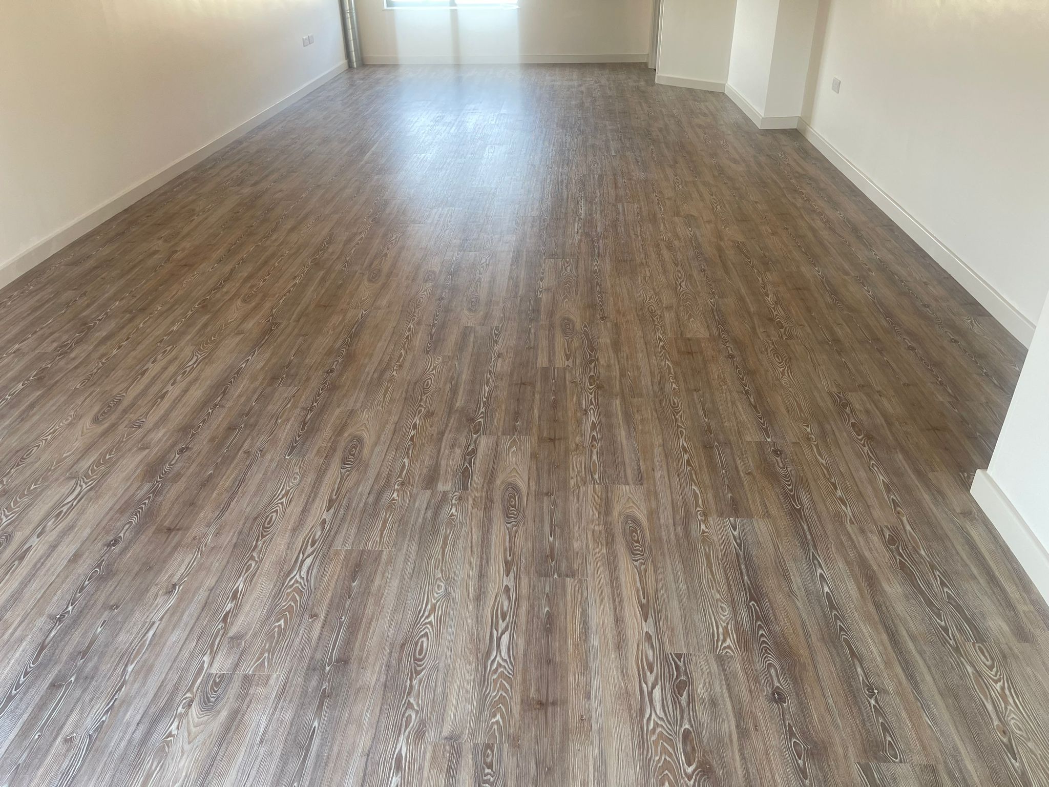 Amtico First Worn Ash installation in Mayfair-0