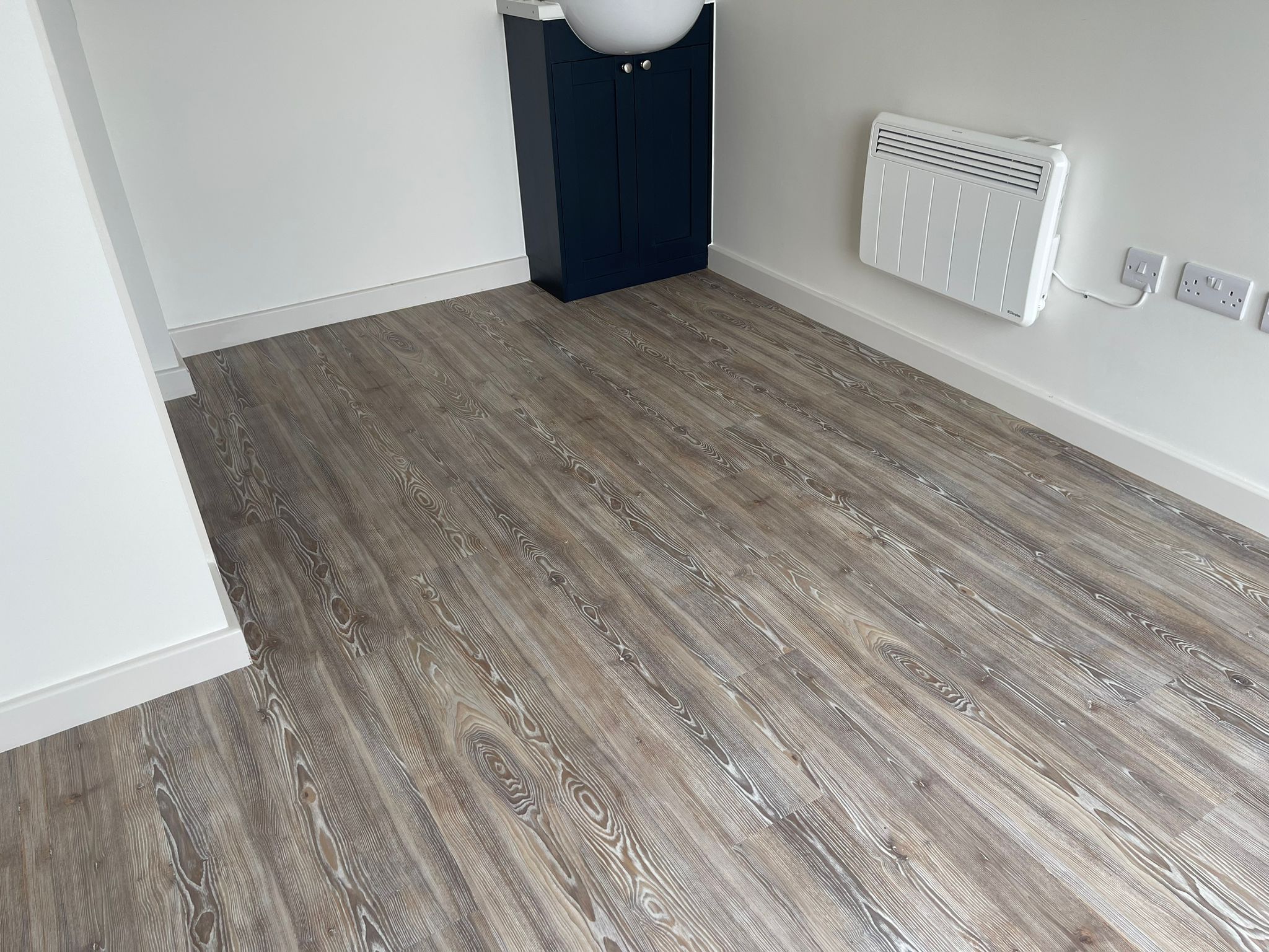 Amtico First Worn Ash installation in Mayfair-2
