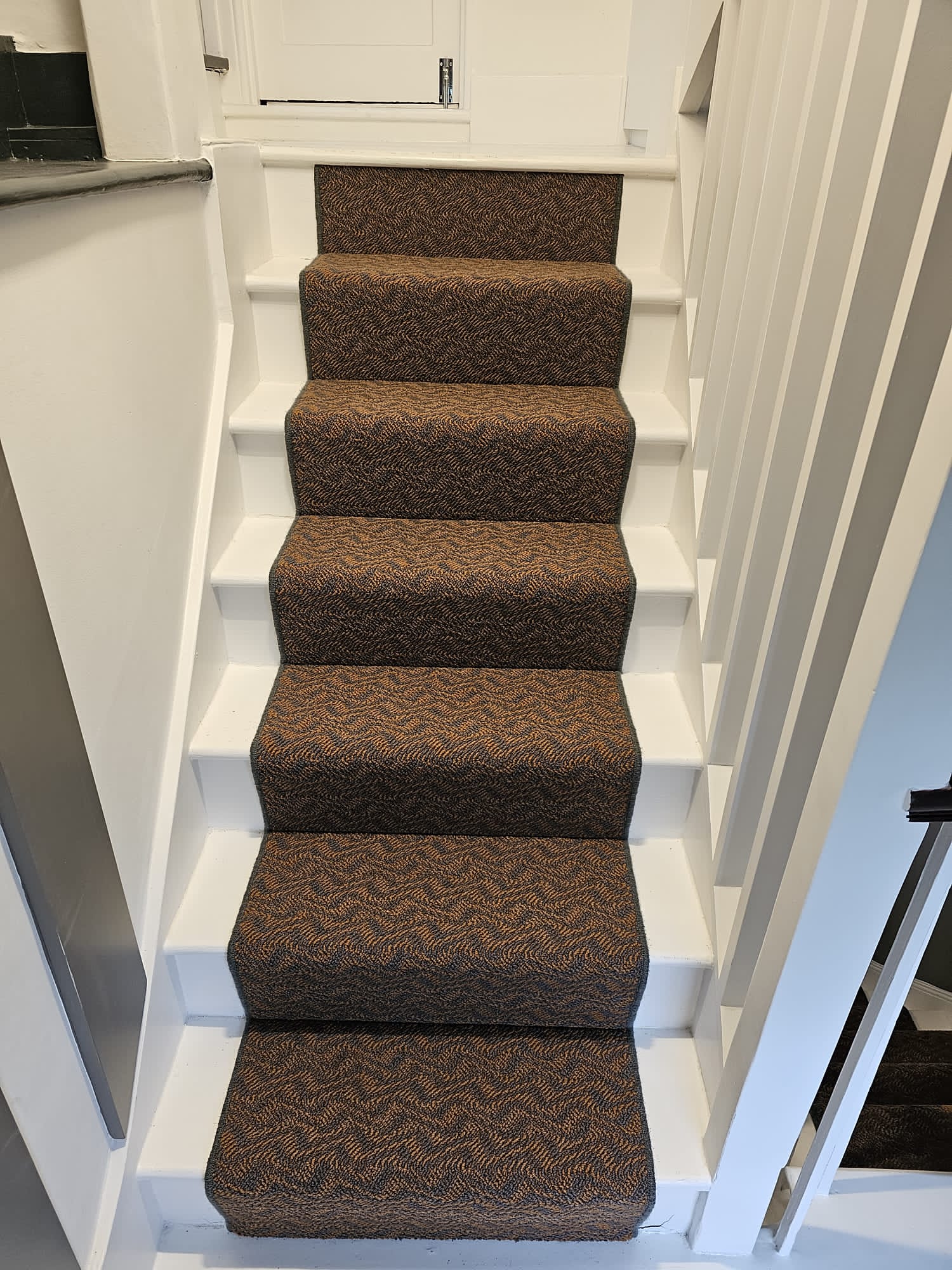 Crucial Trading Enigma Eternal Flame carpet installation in Camden-0